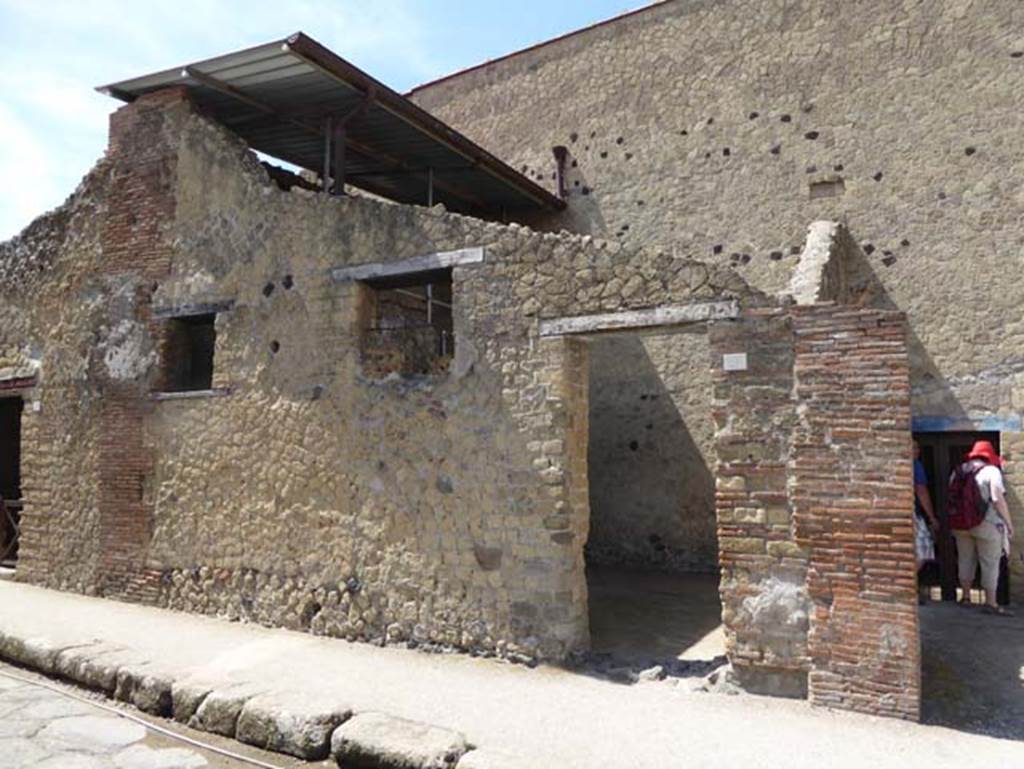 III.9 Herculaneum, July 2015. Looking south from Decumanus Inferiore to entrance doorway, right of centre.  Photo courtesy of Michael Binns.